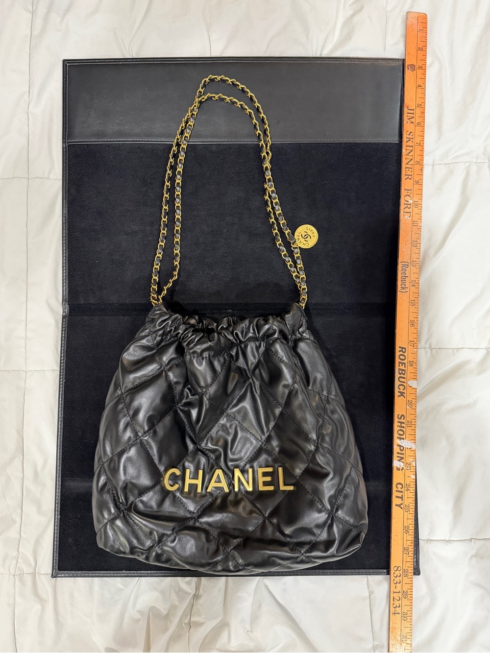 CHANEL 22 HANDBAG
 
Shiny Black & Gold-Tone Metal